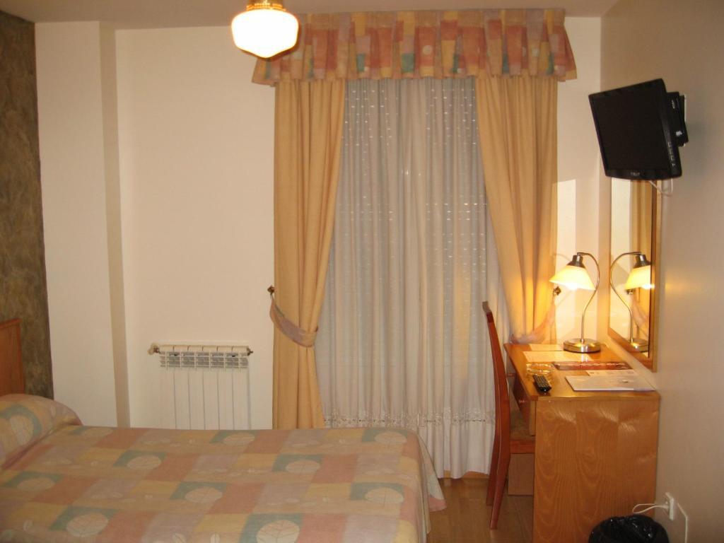 Hotel Camargo Igollo Zimmer foto